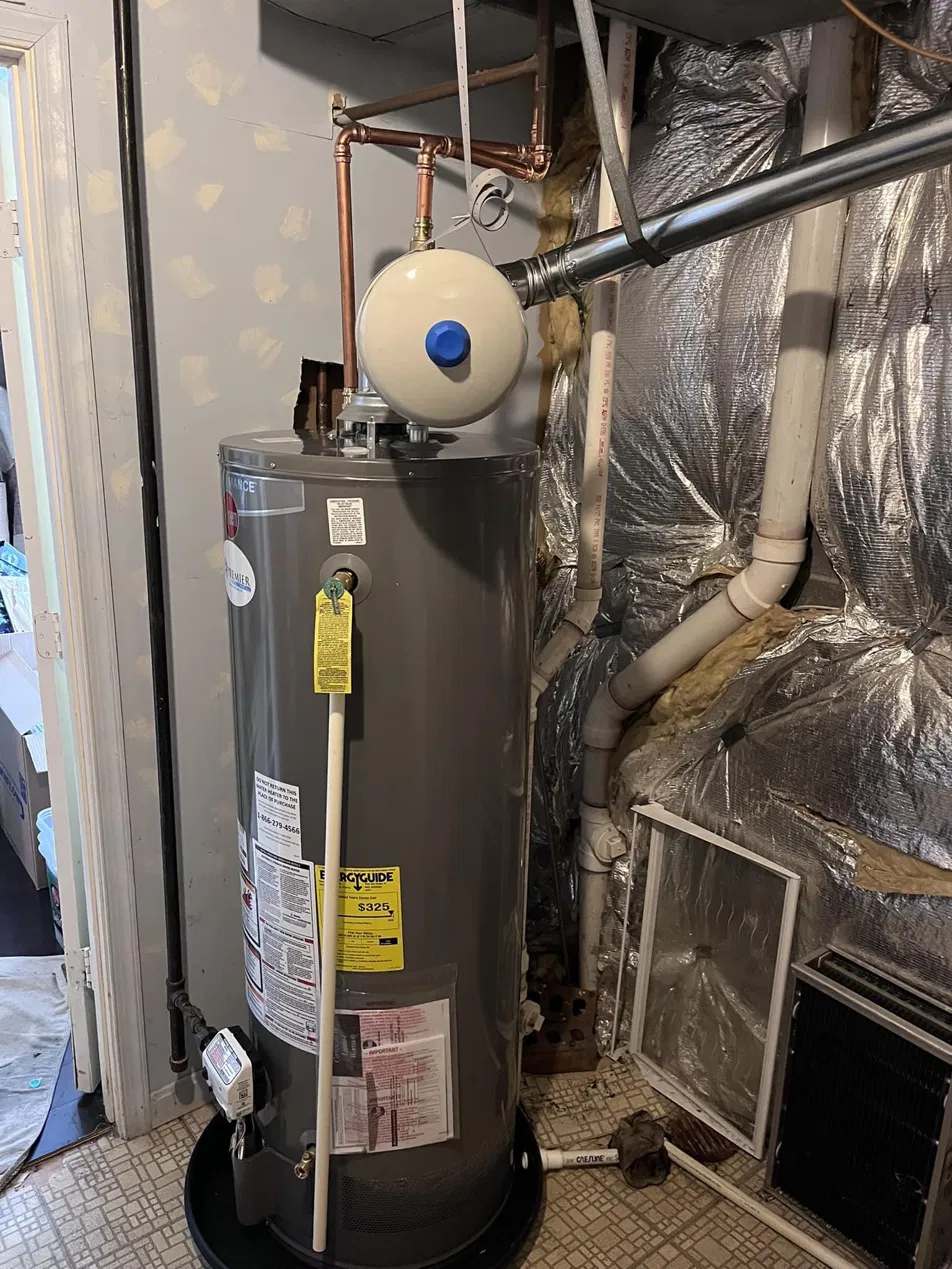 New water heater installs with clean copper piping